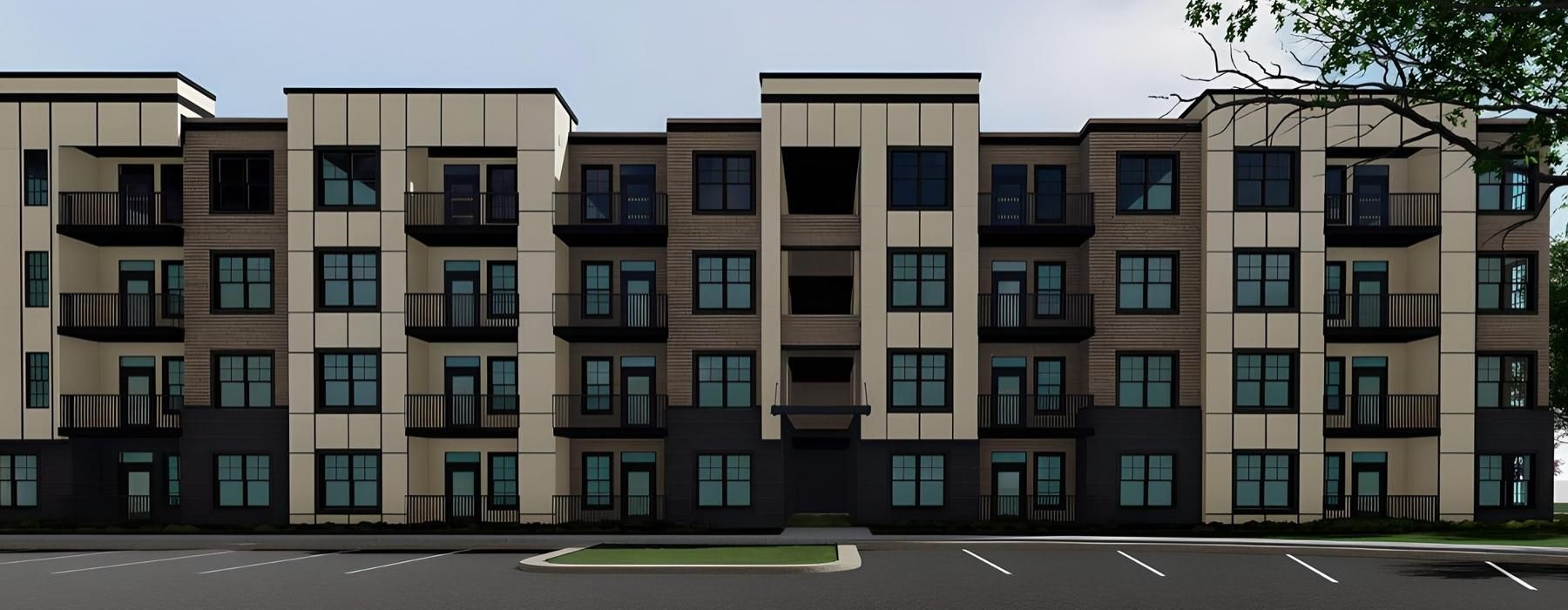 a building with many windows and a parking lot