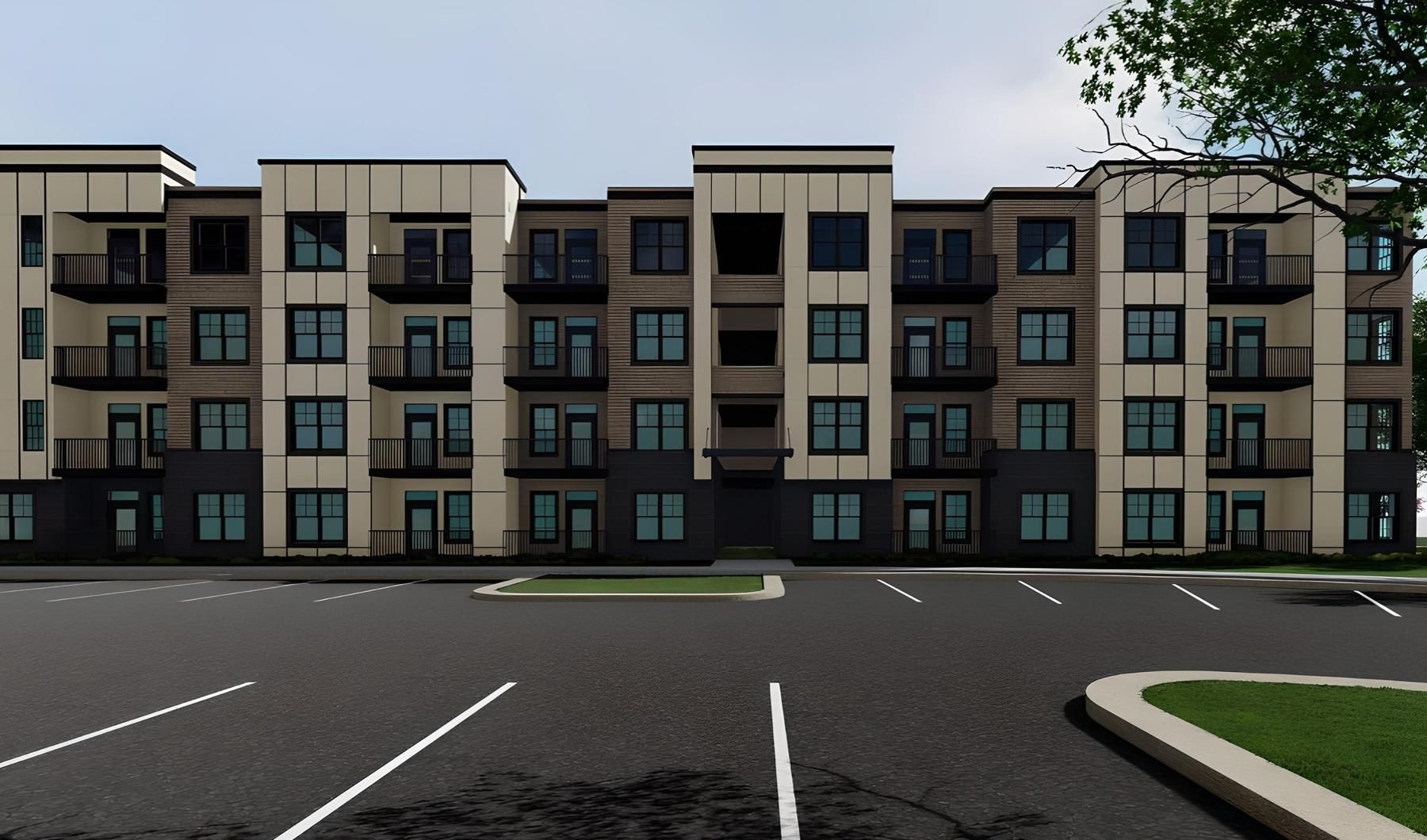 a building with many windows and a parking lot