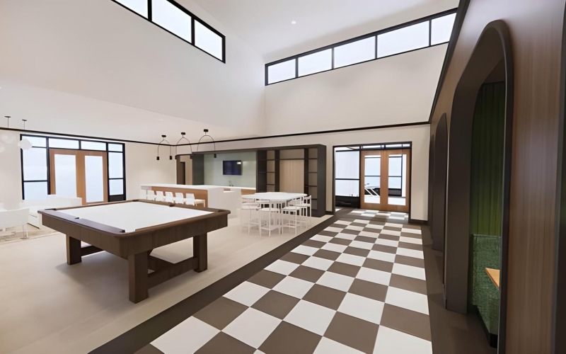 a room with tables and chairs and a pool table